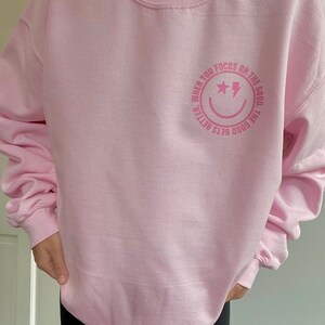 Light Pink Focus on the Good Smiley Crewneck Sweatshirt Retro Lightning ...