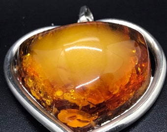 Baltic butterscotch and honey Amber pendant in heart shaped setting