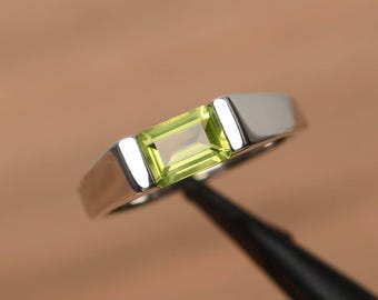 natural peridot solitaire engagement ring sterling silver August birthstone emerald cut east  west ring