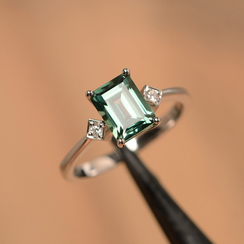 green sapphire ring emerald cut teal gemstone white gold wedding ring