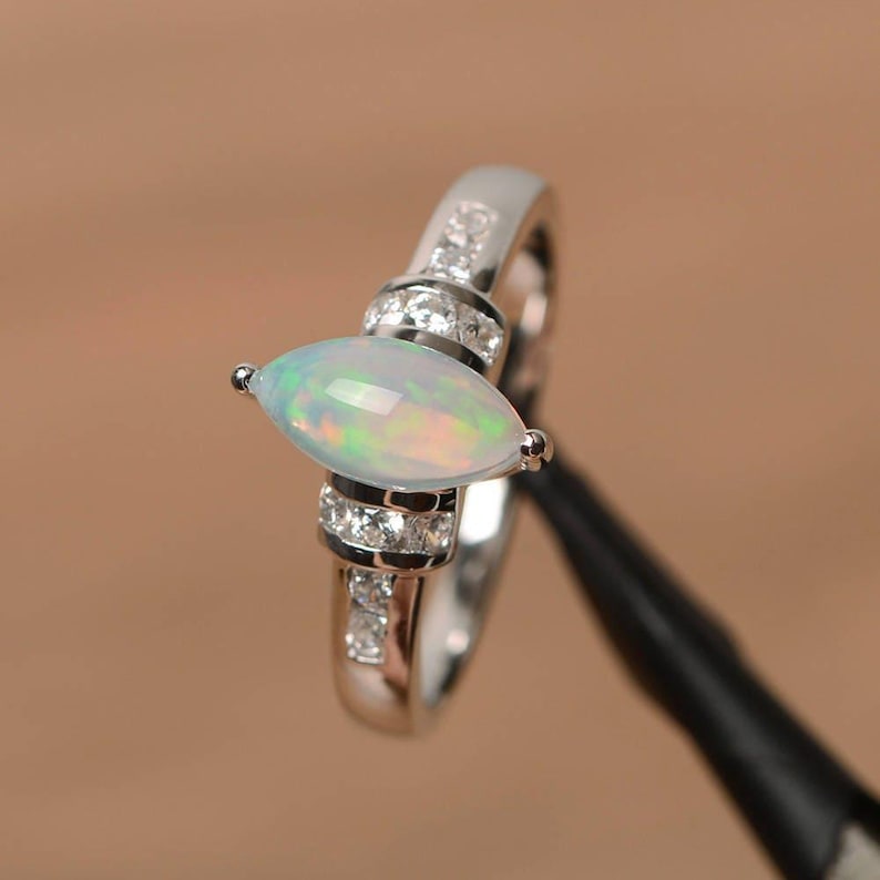 opal engagement ring natural white opal ring October birthstone marquise cut gemstone sterling silver ring image 1