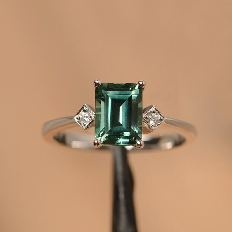 green sapphire ring emerald cut teal gemstone white gold wedding ring