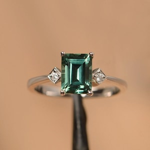 green sapphire ring emerald cut teal gemstone white gold wedding ring