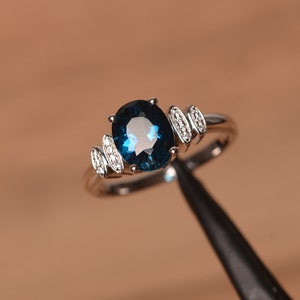London blue topaz engagement ring sterling silver oval cut November birthstone ring