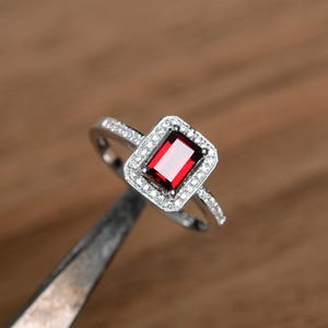 red garnet halo wedding ring emerald cut January birthstone sterling silver engagement ring