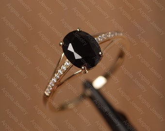 natural black spinel ring oval cut yellow gold engagement ring