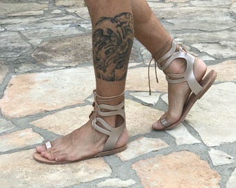 Mens gladiator sandals ankle high in genuine leather, stylish statement summer shoes, barefoot toe ring foot wear in gold metallic leather
