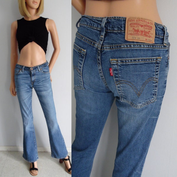 Levis 529 jeans, blue denim pants trousers, flared bootleg, low rise hipster, waist 27, leg 34, small