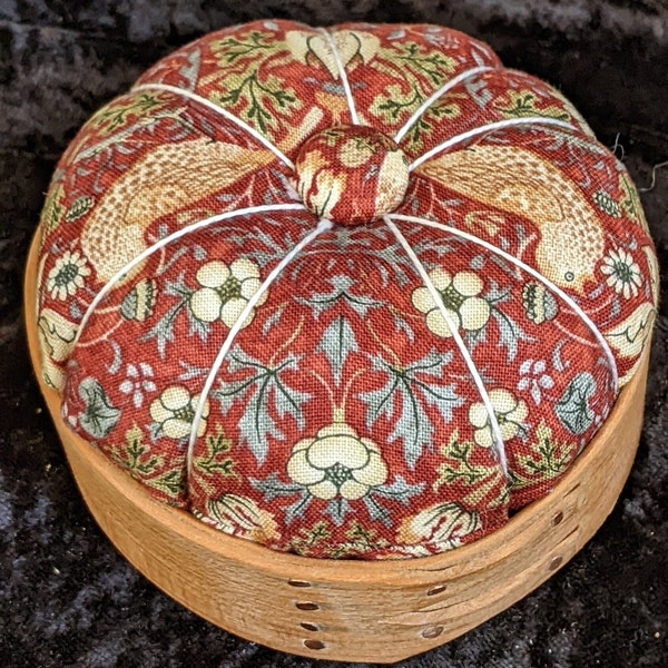 Handcrafted shaker pincushion with William Morris fabric