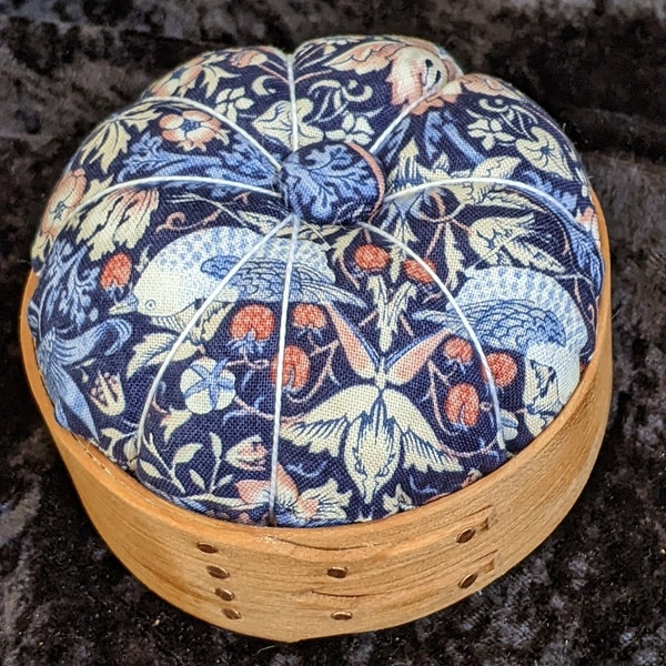 Handcrafted shaker pincushion with William Morris fabric