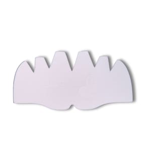 May include: White plastic cake decorating tool with a scalloped edge and the text "Shapers Image" printed on the front.