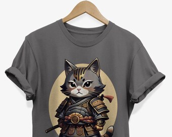 May include: A dark gray t-shirt with a cartoon illustration of a gray and white cat wearing samurai armor and holding a sword. The cat is standing in front of a yellow circle.