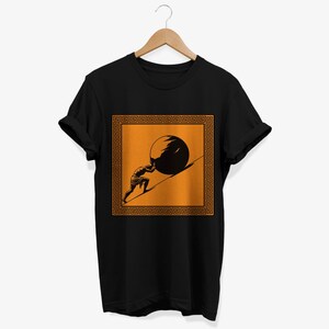 May include: Black t-shirt with an orange graphic of a figure pushing a large stone uphill, framed by a Greek key border.
