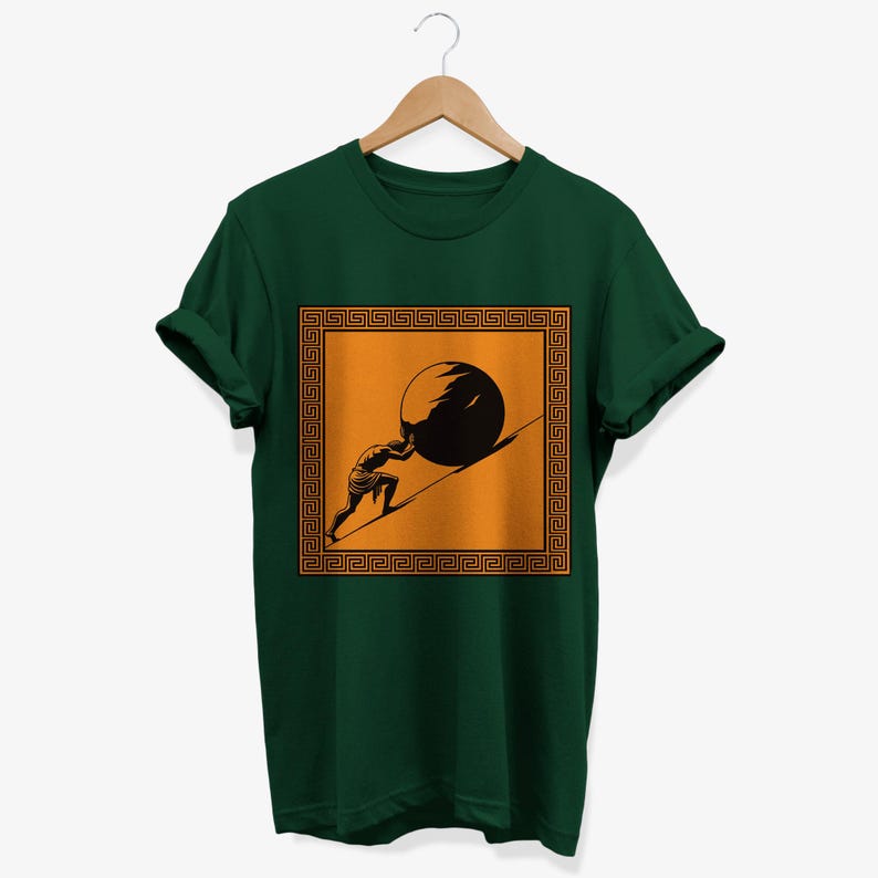 May include: A dark green t-shirt with a graphic of a person pushing a large stone uphill. The graphic is framed by a gold Greek key border and set against an orange background.