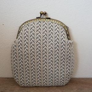 Clutch brings everything, hand clutch, click clac clutch, snap clutch, sage green fan clutch