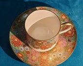 Vintage Japanese Satsuma thousand flower Millefiori tea cup and saucer. Koshida hand-painted. Gilding and moriage enamel beading. Post war