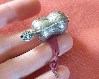 Antique Novelty Sewing Tape Measure. Sterling Silver Nut Tape Measure with Silk Ribbon