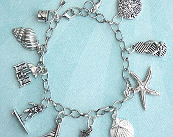 Beach themed charm bracelet- seashells bracelet