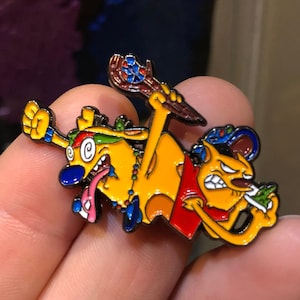 Raging Cat Dog 90’s Cartoon Festival Pin – Nickelodeon Inspired, 1.5" Hat Pin, Limited Edition, Found at Lost Lands & Bonnaroo