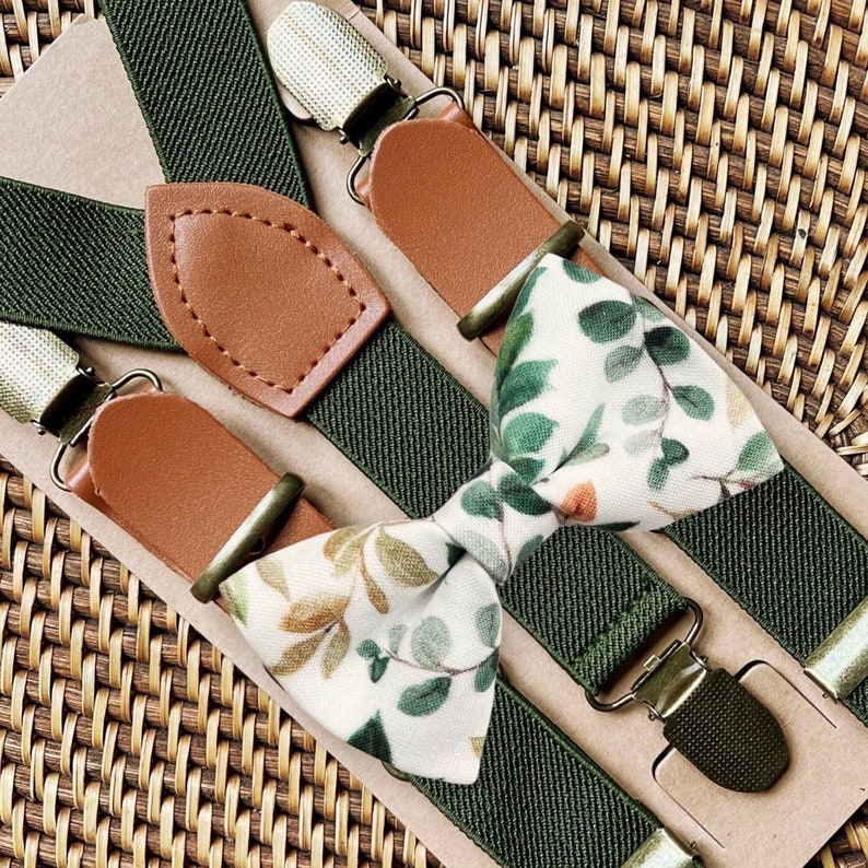 Sage green floral bow tie and green suspenders.