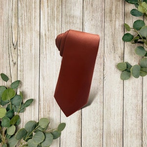 Satin terracotta neck tie for a fall wedding, groomsmen, or ring bearer outfit.