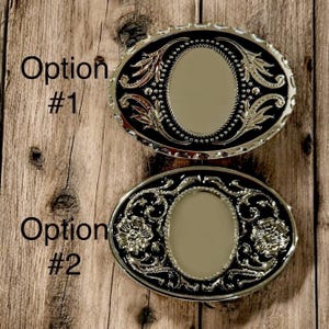 Two options of belt buckles: Option #1 has a leaf design and Option #2 has a floral design. Both are silver and black from The Bold Bow Tie.
