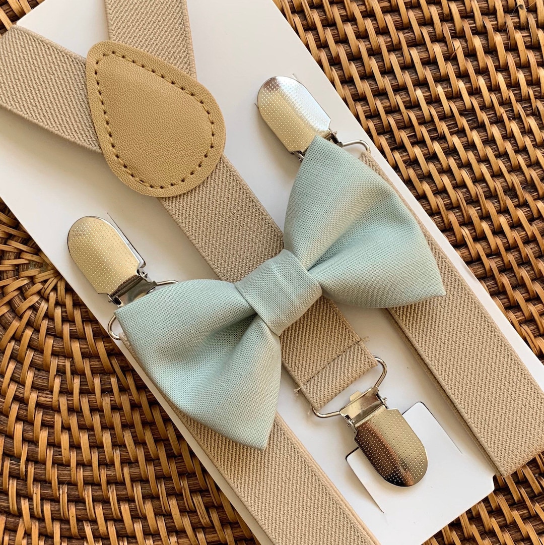 Groom's Navy Suit with Sage Green Bow Tie, August Wedding Attire