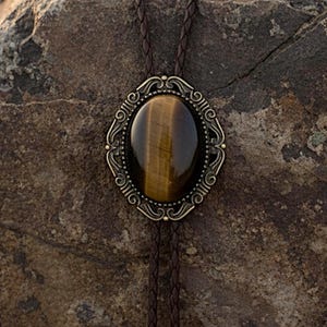 Tiger’s eye bolo ties for wedding.