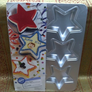 New Wilton Mini Stars Cake Pan. 6 cavities. Discontinued from Wilton. Fourth of July, Individual serving pan. Mini Stars. Wilton Cake Pan