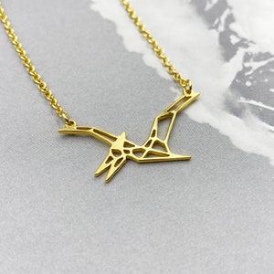 Collar de pterodáctilo de origami: joyería de dinosaurio bañada en oro y plata para amantes de los dinosaurios.