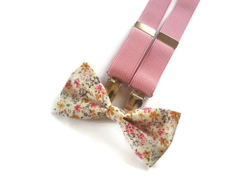 soft pink suspenders and ecru pink mustard floral bow tie for groom and groomsmaids fall wedding attire ideas for ring bearer best man