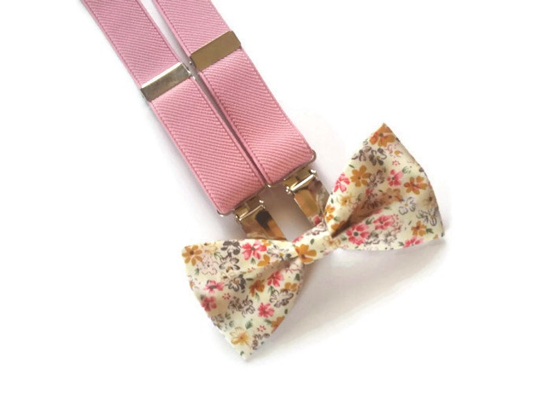 soft pink suspenders and ecru pink mustard floral bow tie for groom and groomsmaids fall wedding attire ideas for ring bearer best man