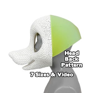 Könnte beinhalten: Ein weißes, strukturiertes Hundekopfmuster mit einem grünen Rückenteil. Der Text "Head Back Pattern" und "7 Sizes & Video" sind sichtbar. Das Kopfmuster ist für das Basteln konzipiert.
