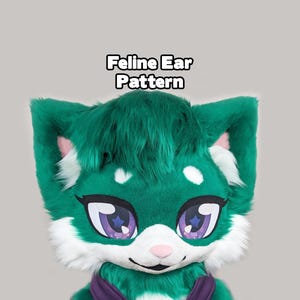 May include: A green and white feline mask with large purple eyes and a pink nose. The mask has a fluffy texture and the text "Feline Ear Pattern" is displayed above the mask.