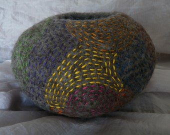 Soft pot shaped hand felted vessel, decorated with multi coloured stitching