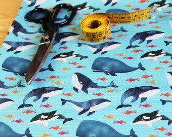 Tessuto in RASO di 100% cotone, Balene e pesci colorati su sfondo celeste,  stampa esclusiva originale disegnata da CrisDeMarchi Atelier