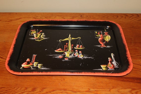 vintage black metal serving tray with apothecary theme apothecary theme