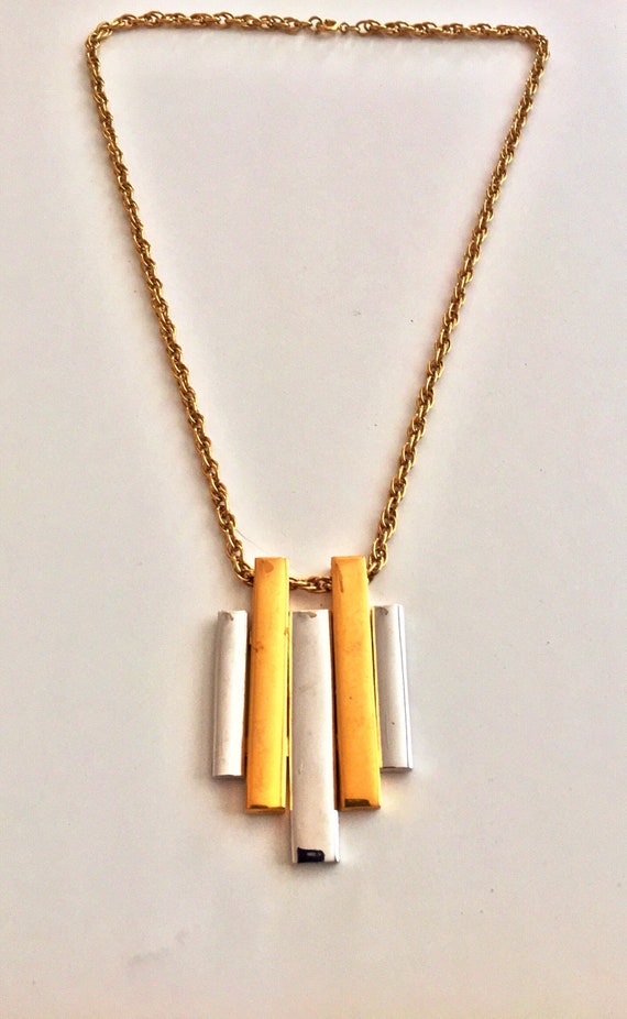 This is a Modernistic Pendent Groovy Necklace from