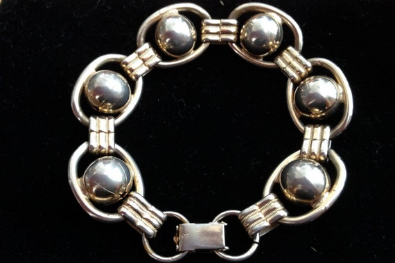 A 1930's-1940's Deco Sterling Bracelet with Gold … - image 1