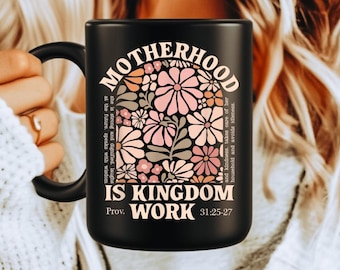La maternité est un travail du Royaume Mug | Céramique noire, 15 oz