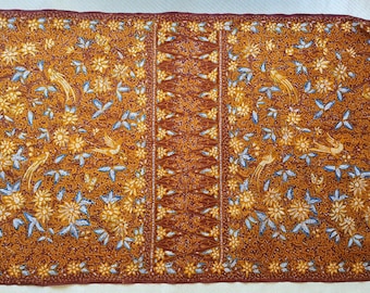 Indonesian batik fabric, traditional sarong for kebaya in brown birds and floral design