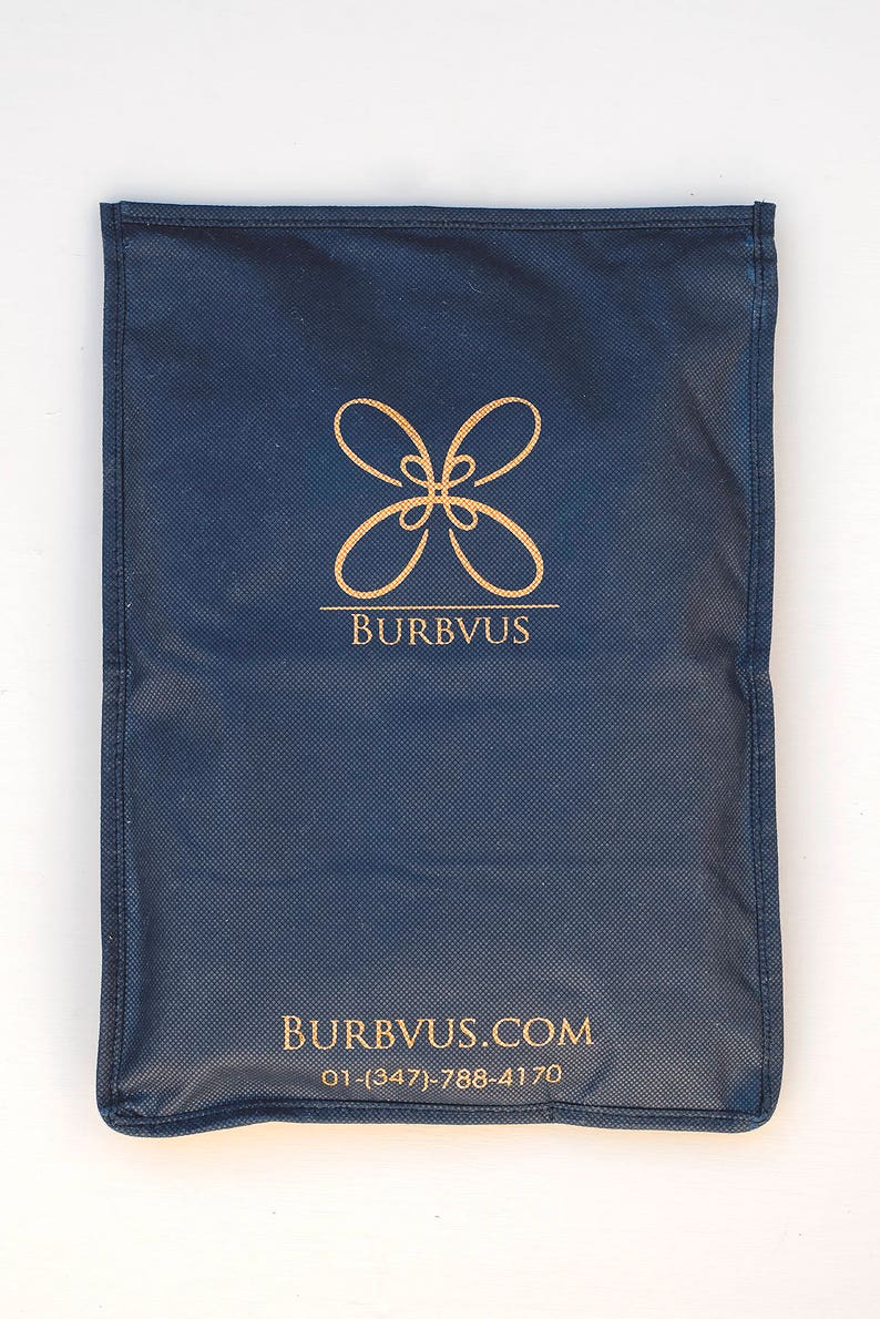 May include: A dark blue fabric bag with a gold logo that says "BURBVUS" and the website address "BURBVUS.COM" and phone number "01-(347)-788-4170".