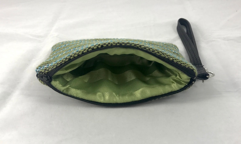 with green satin lining green wristlet with bluewhite stripes Wristlet handmade and handwoven