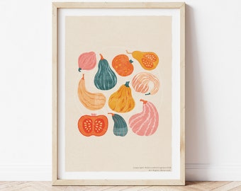 May include: A framed art print featuring a collection of colorful gourds in various shapes and sizes. The gourds are in shades of orange, pink, green, and yellow, arranged on a cream-colored background. The print is in a light wooden frame.