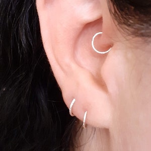 Modeled brilliant hoop earring. Many gauges and diameters are available for this hoop to fit every piercing.