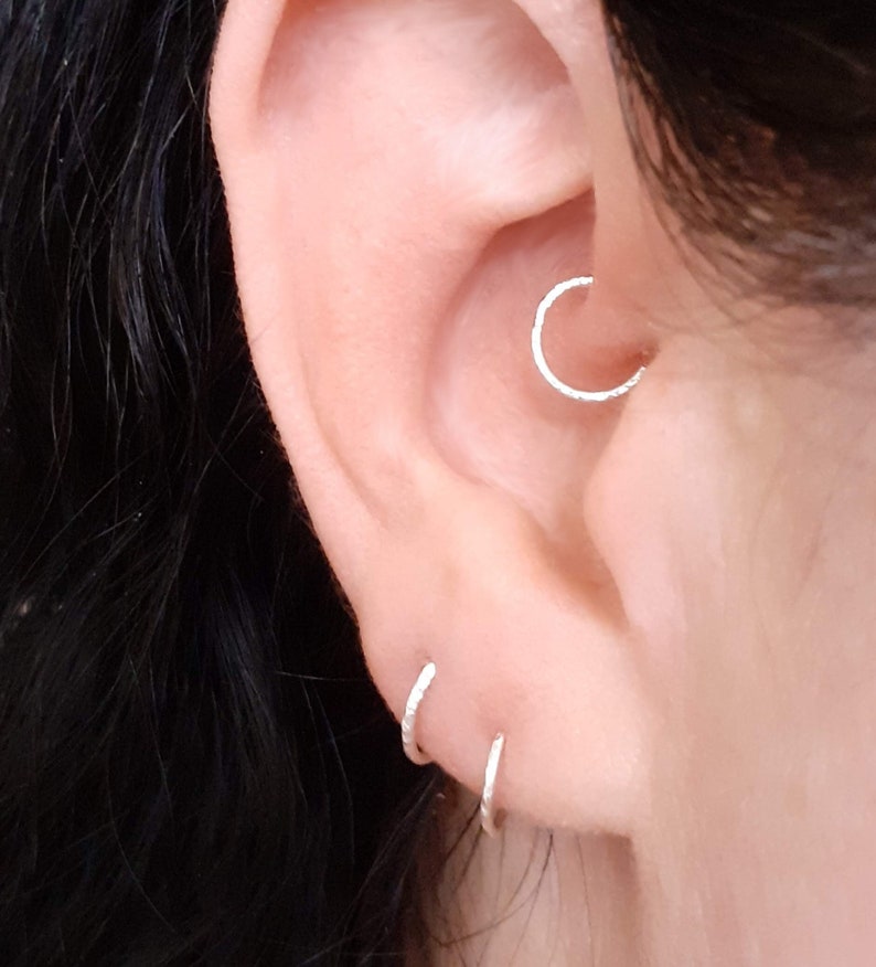 Modeled brilliant hoop earring. Many gauges and diameters are available for this hoop to fit every piercing.