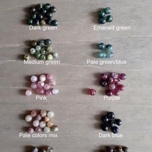 The colors of tourmaline available for this hoop: black, green, blue, pink, purple, mixed colors and brown.