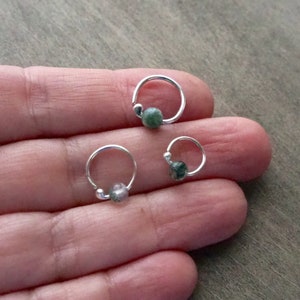 Three sterling silver hoops with bead of moss agate on a hand to show dimensions. Please, choose gauge and dimensions at checkout.