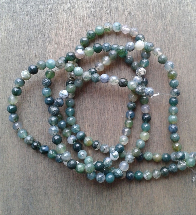 Moss agate beads. Please, feel free to contact me if you have a specific texture or color in mind.