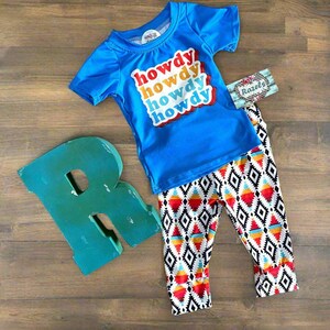 Retro Howdy Kids Western Outfit! 🤠✨ Featuring stylish Aztec jogger pants and a retro-inspired "Howdy" tee, this fun and comfy set is perfect for playtime, casual outings, or celebrating Western-themed events. 💥👕 Ships FREE with $35+ order